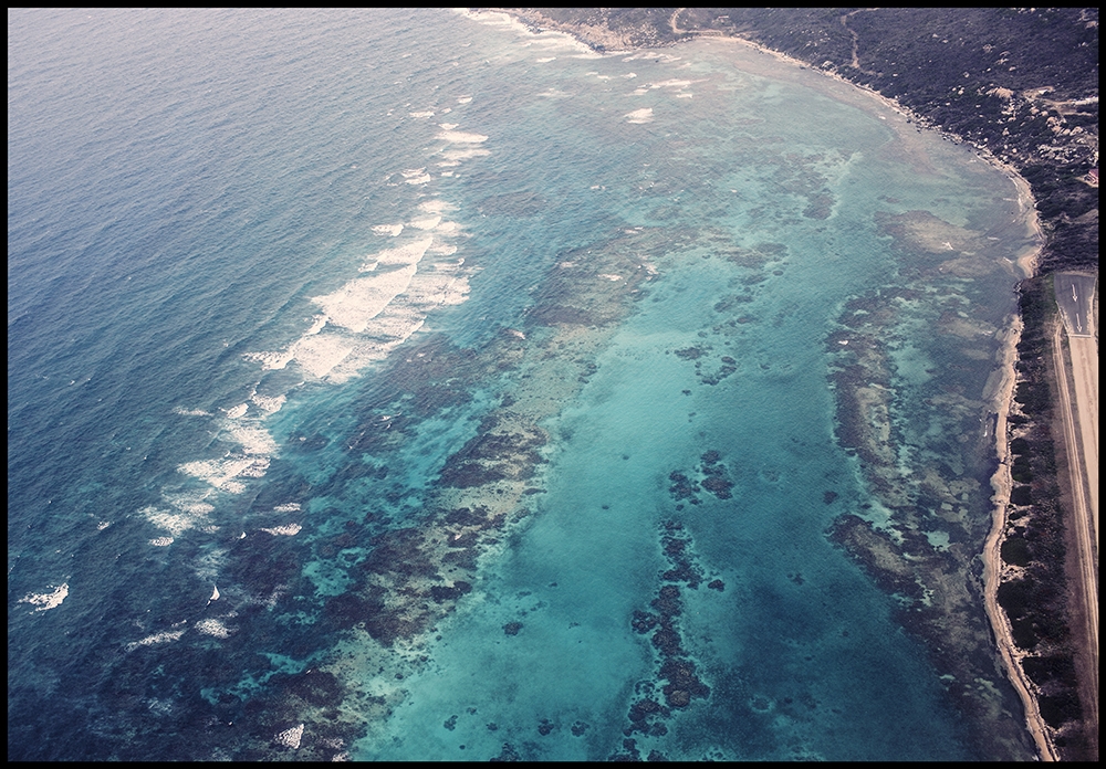 A view of the reefs and coastline from above 