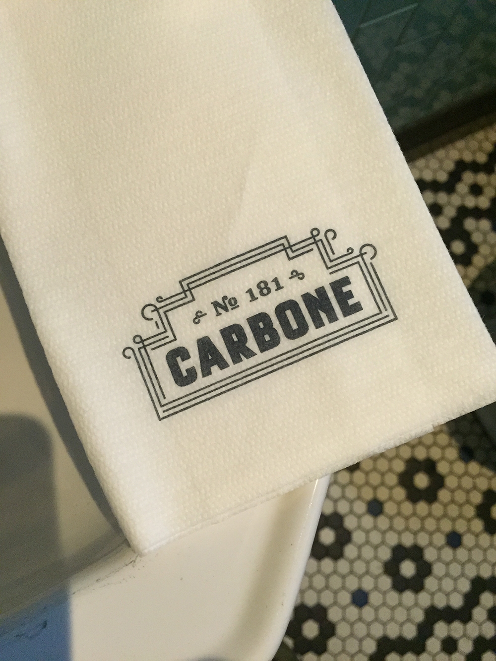 A branded napkin at Carbone, Greenwich Village 