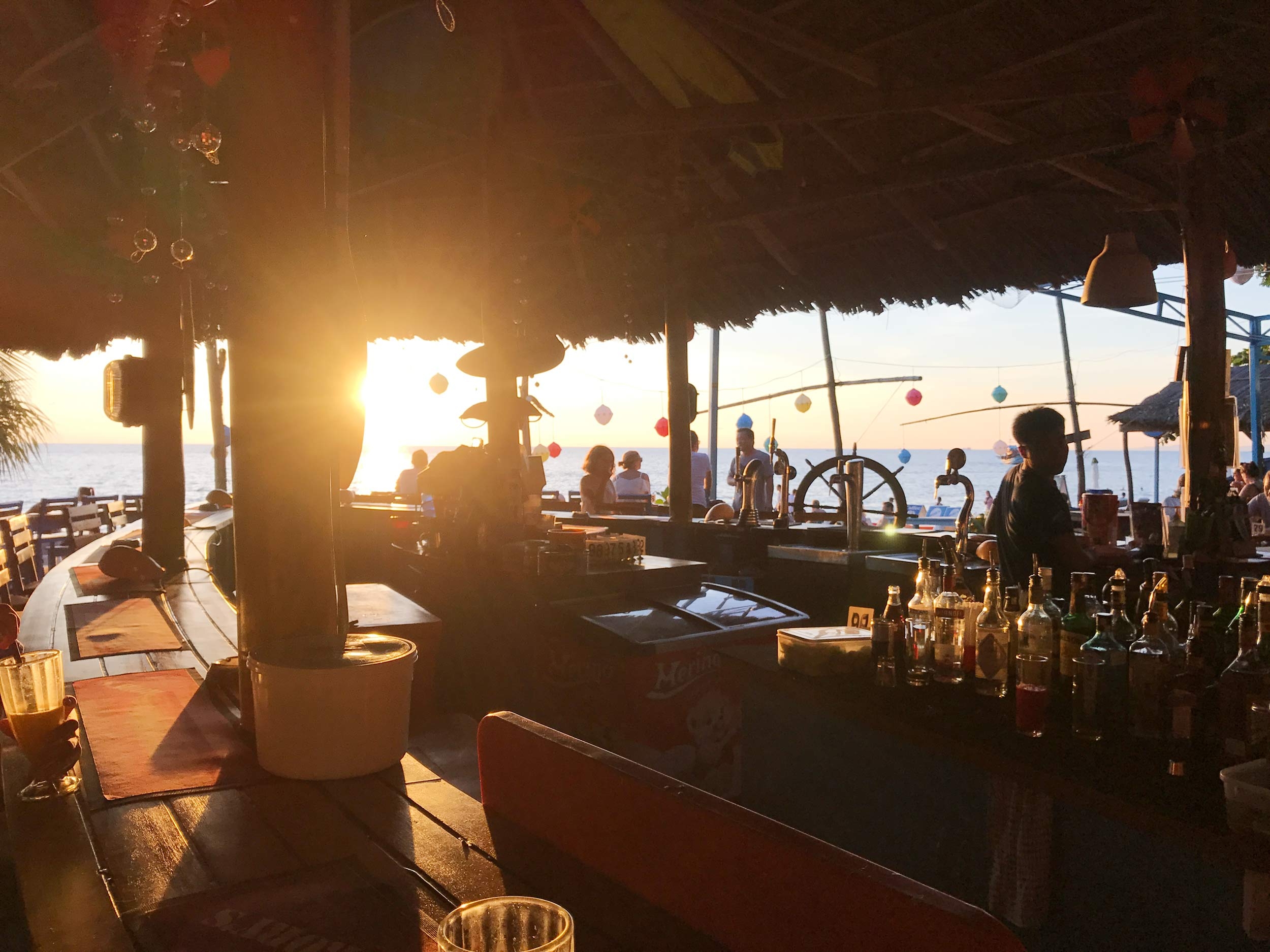 Rory’s Beach Bar sits by the water and is sun kissed as the evening rolls in
