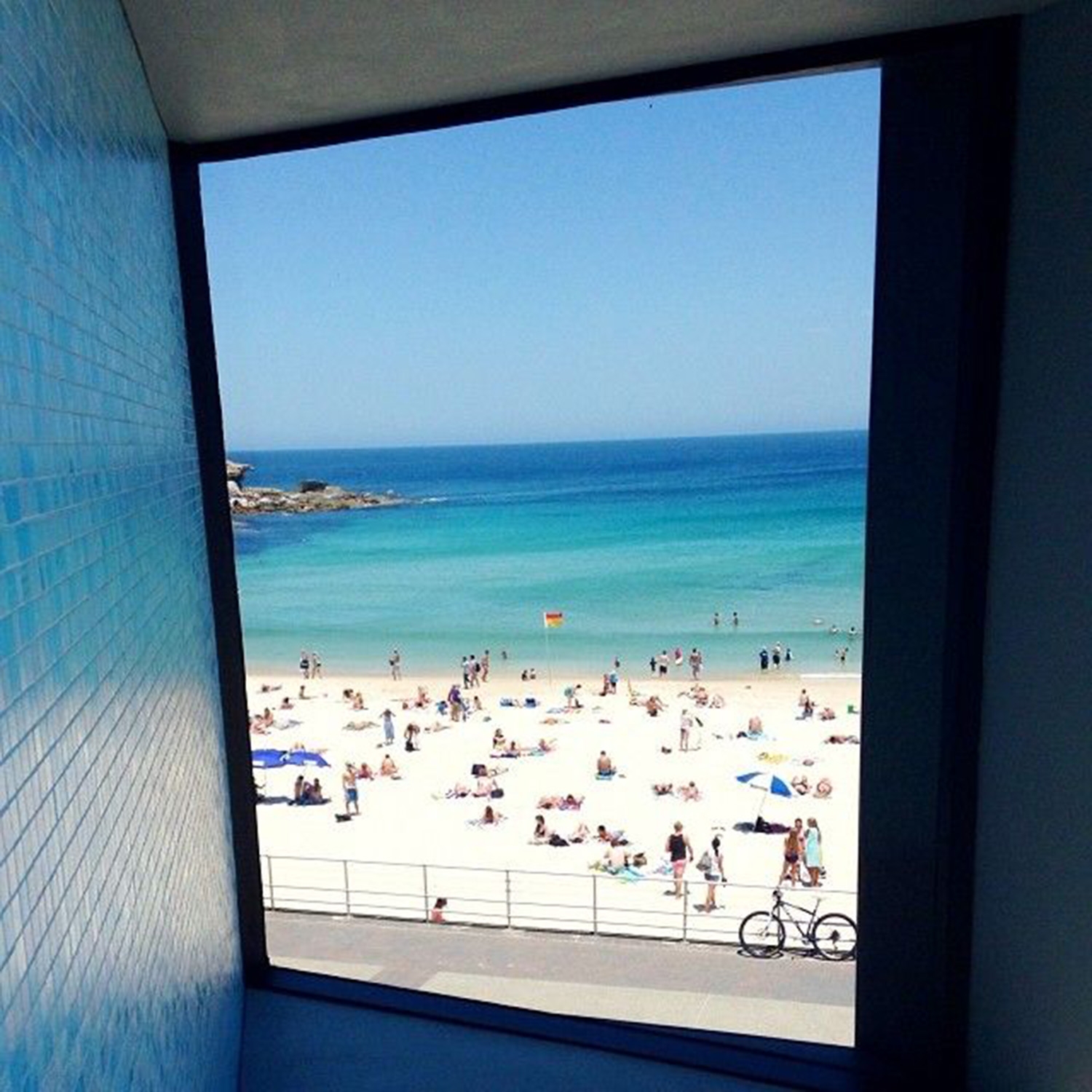 Looking out at the beach from a window in North Bondi Surf Club 